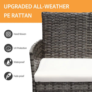 Close-up of the grey woven rattan chair back and curved armrest with a white seat cushion.