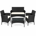 4-piece black rattan garden sofa set with two armchairs and a glass-top coffee table